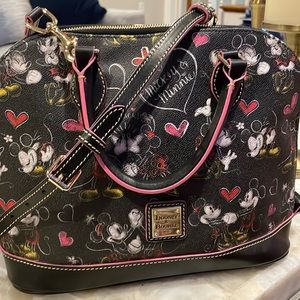 Like new Disney Mickey and Minnie Disney D&B purse.  Excellent condition